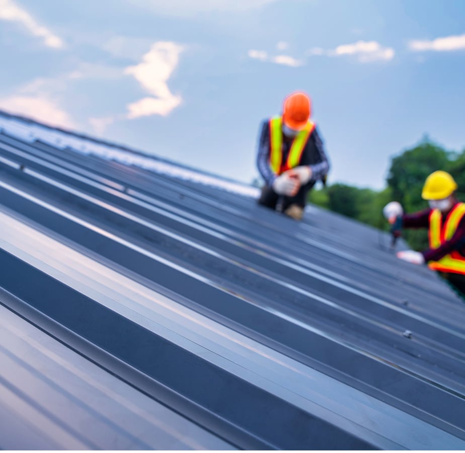 Men Fixing Roof